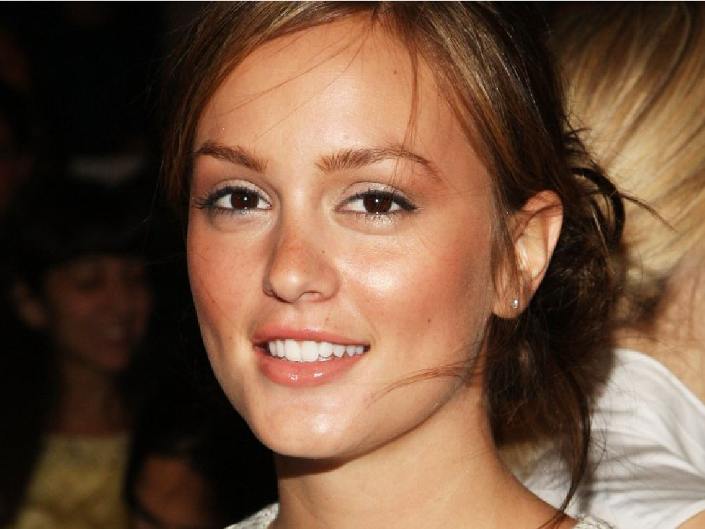 Smiling woman with light makeup